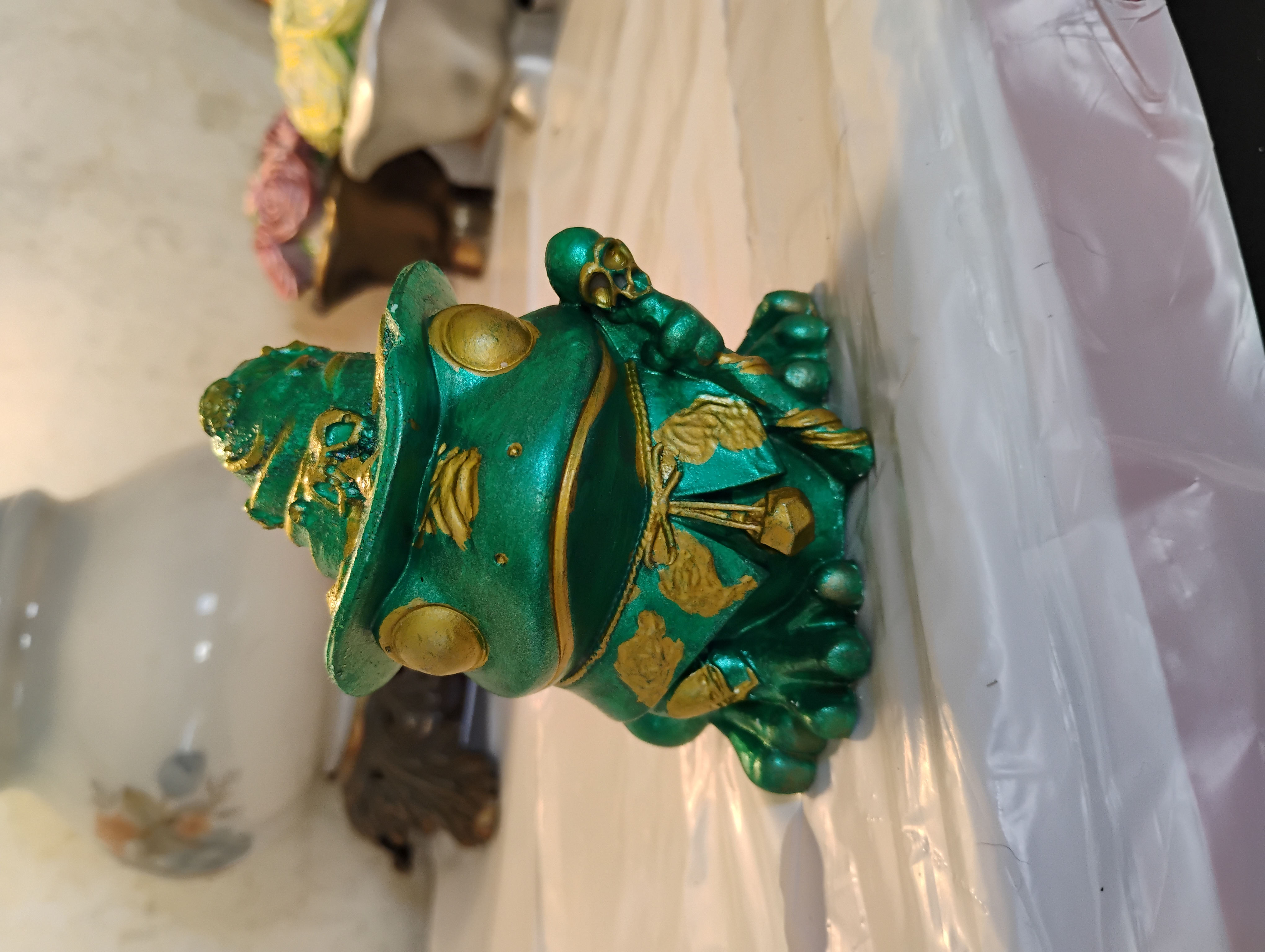 Emerald green frog
